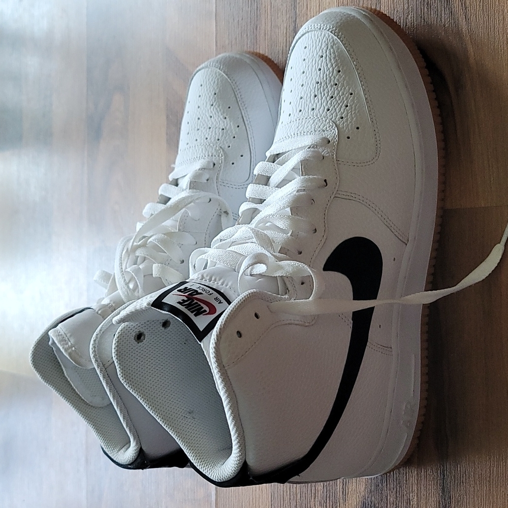Men's Nike Air Force high-top Size 11.5 white with black swoosh, bubblegum sole